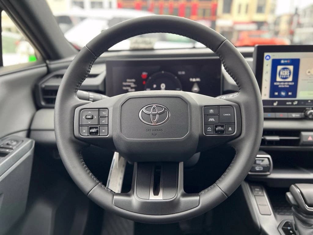 Toyota RAV4 Plug-In Hybrid SE (Natl) 2026 — side view