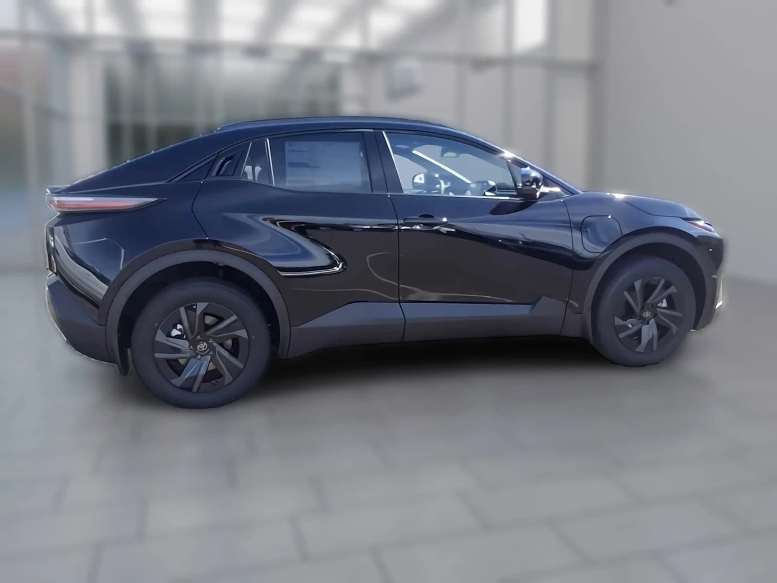 Toyota C-HR SE AWD (Natl) 2026 — side view