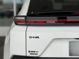 Toyota C-HR SE AWD (Natl) 2026 — side view