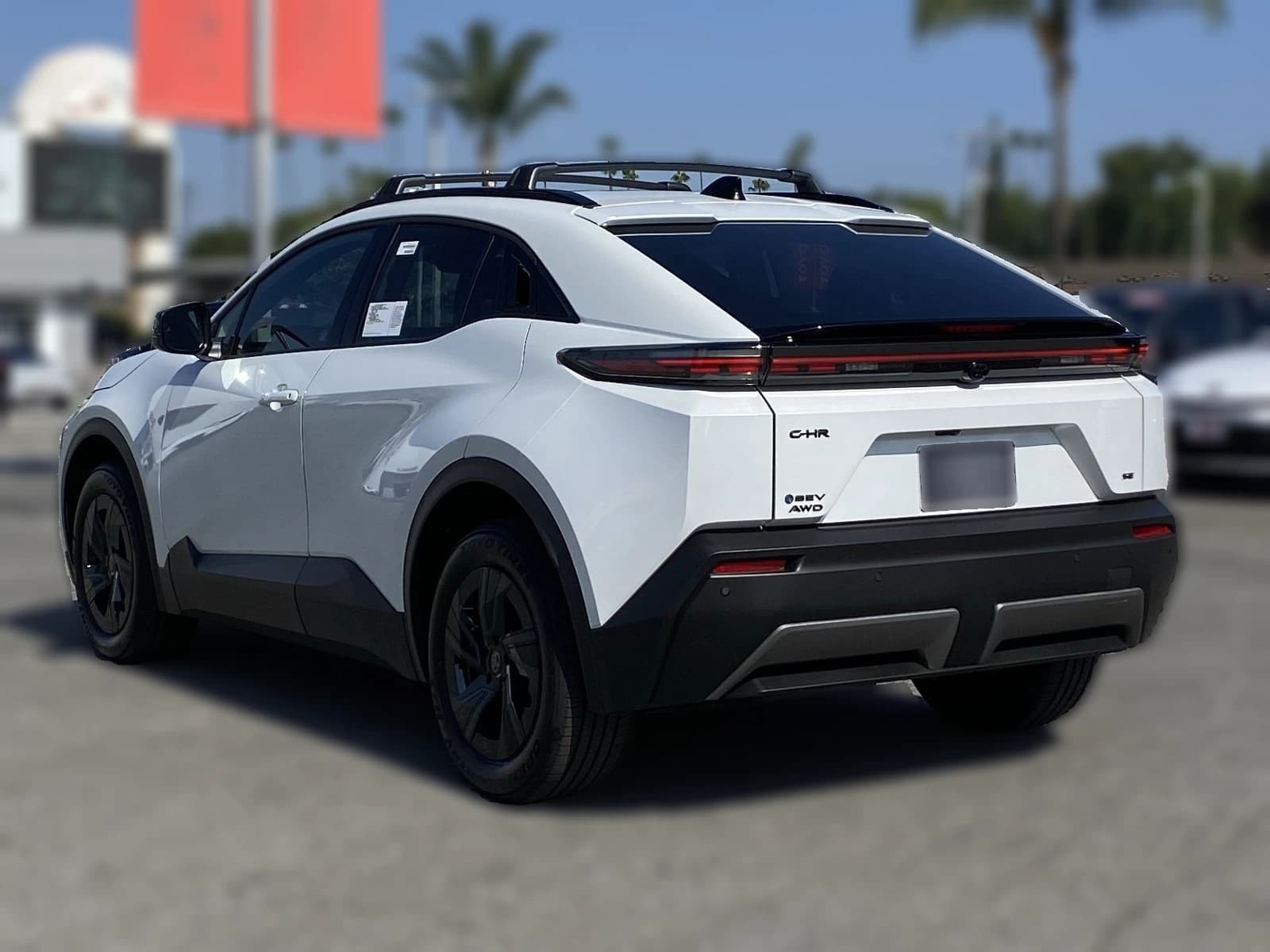 Toyota C-HR SE AWD (Natl) 2026 — side view