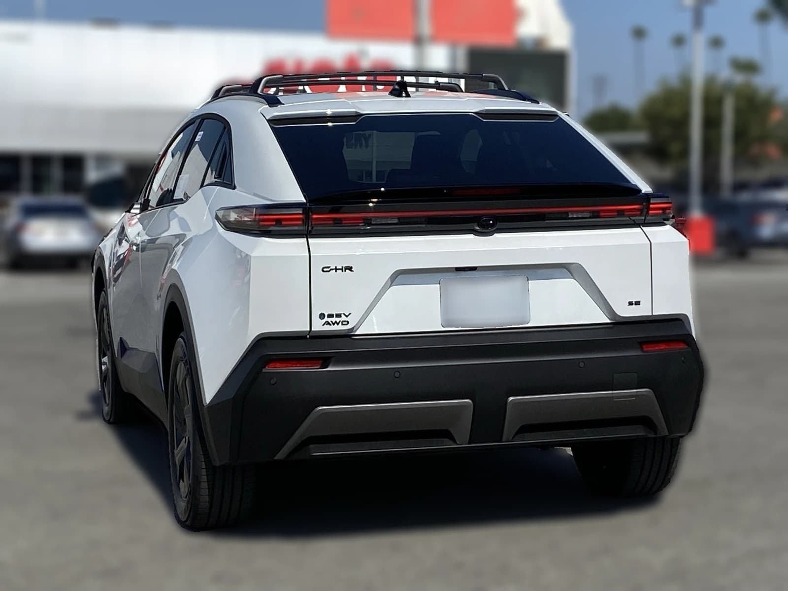 Toyota C-HR SE AWD (Natl) 2026 — side view