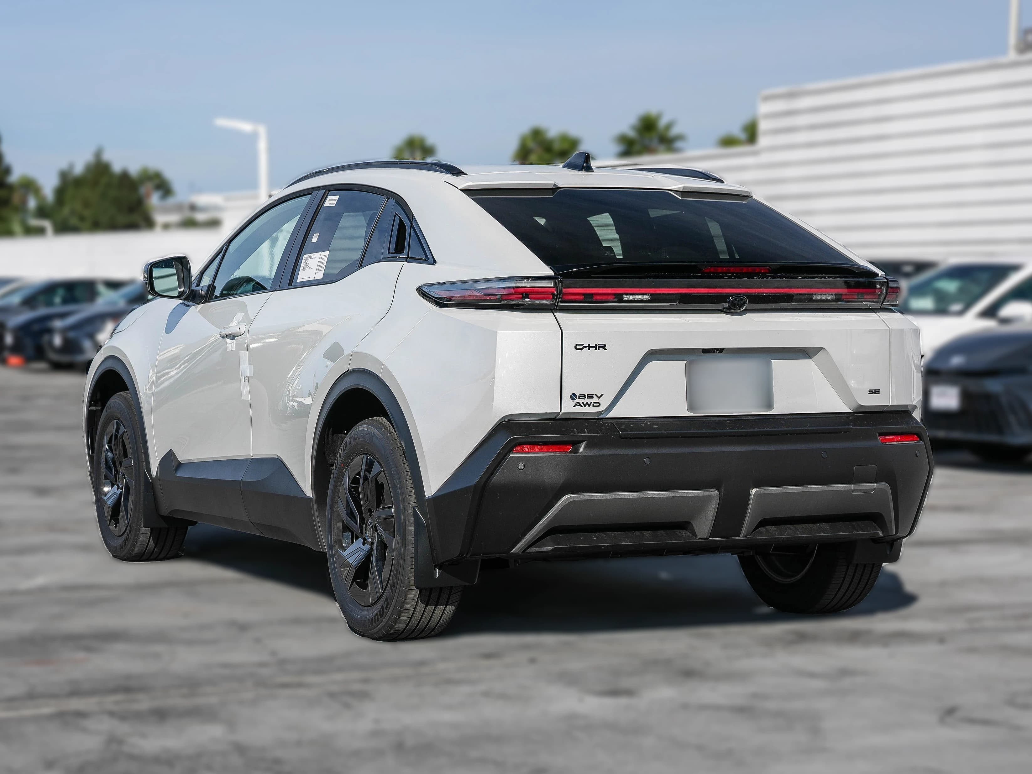 Toyota C-HR SE AWD (Natl) 2026 — side view