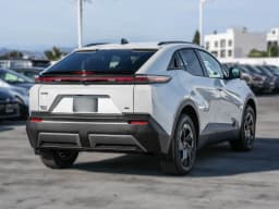 Toyota C-HR SE AWD (Natl) 2026 — side view