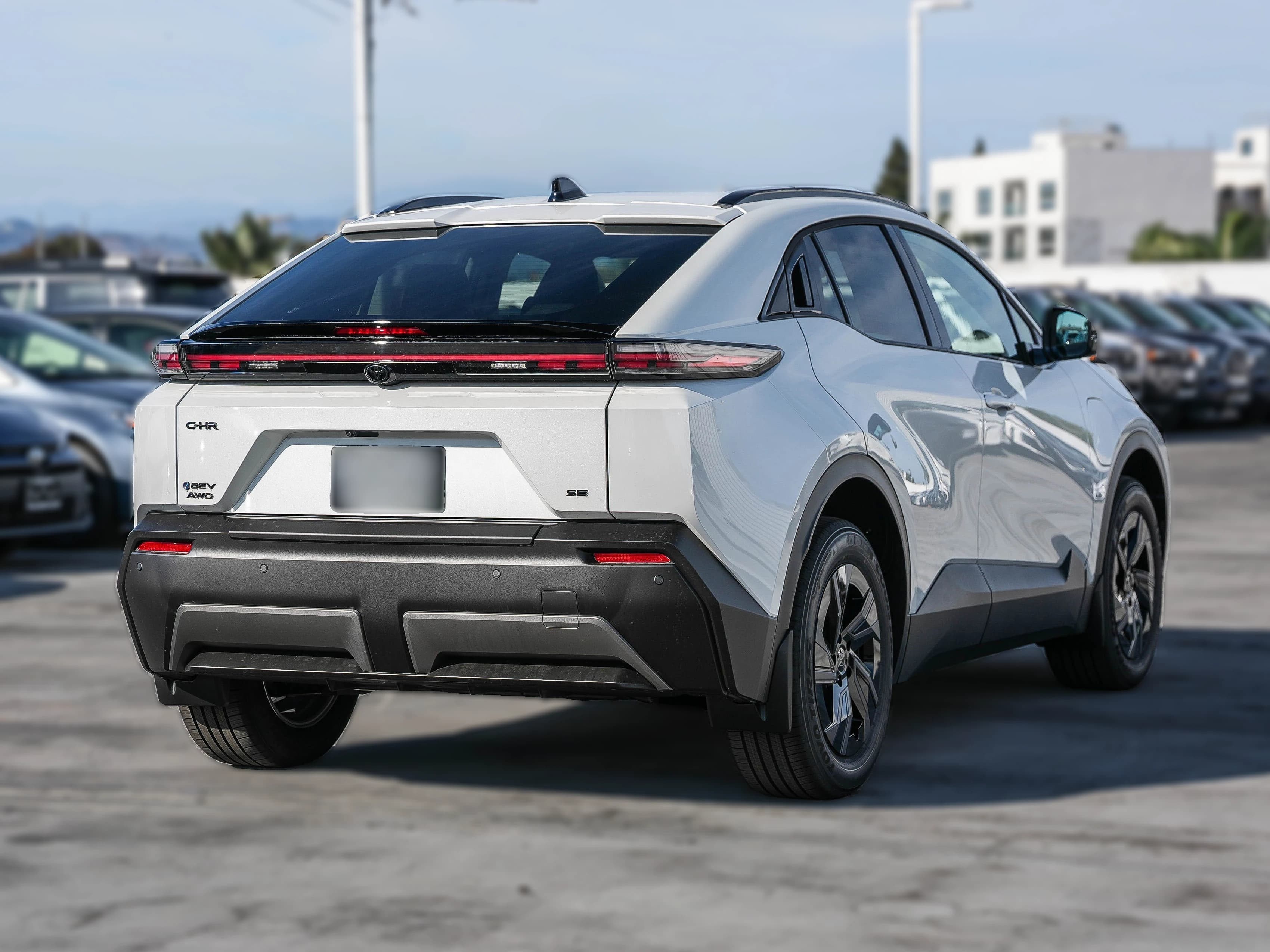 Toyota C-HR SE AWD (Natl) 2026 — side view