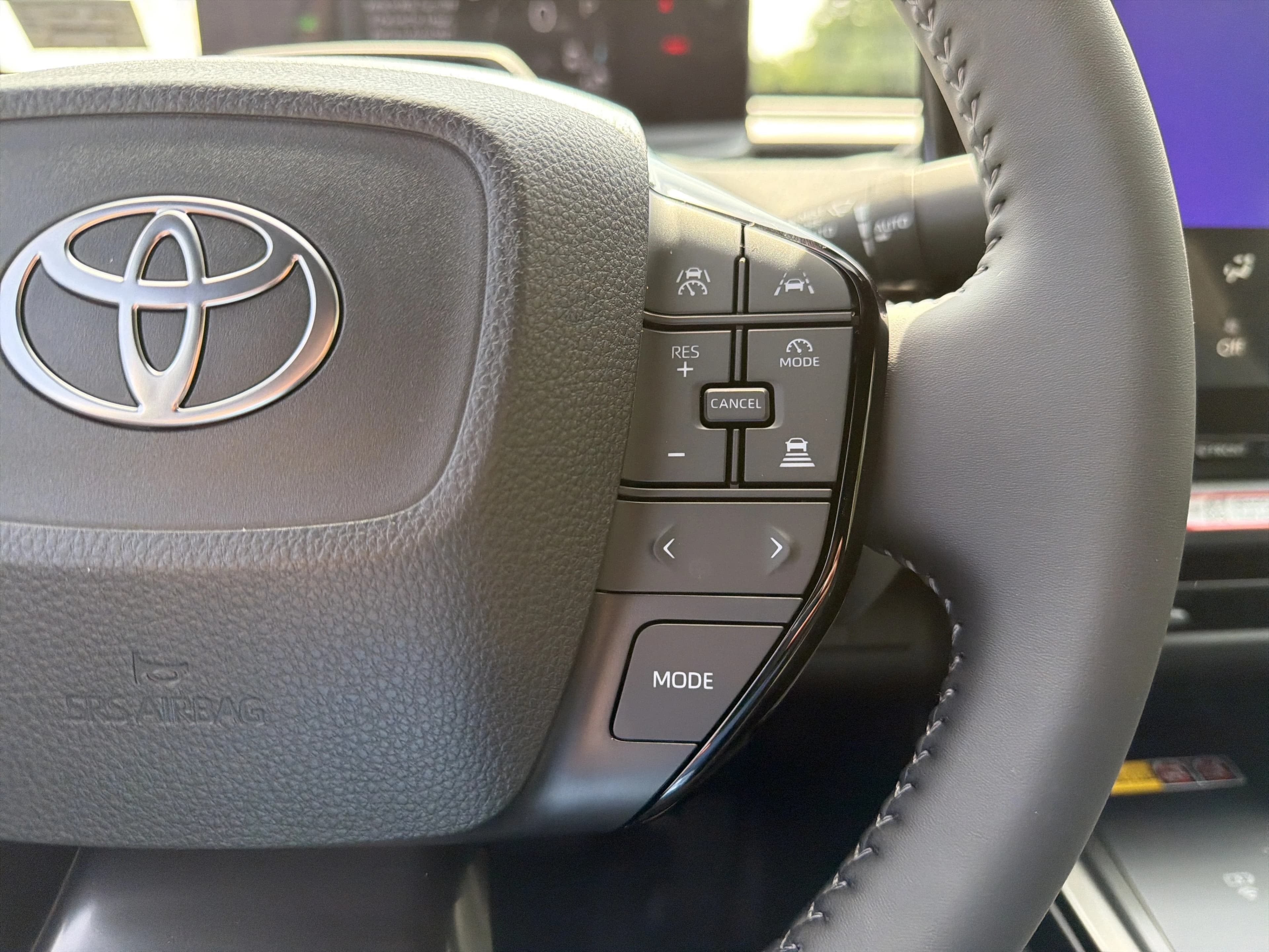 Toyota bZ XLE Plus FWD (Natl) 2026 — side view