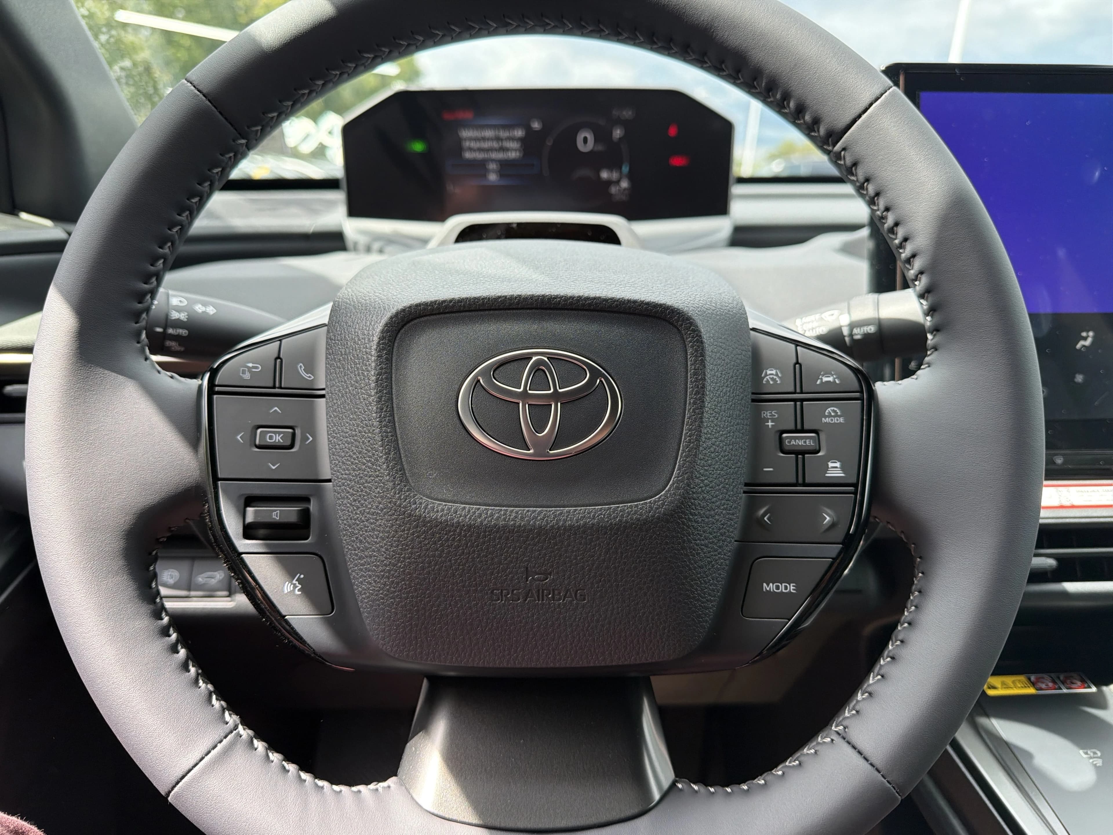 Toyota bZ XLE Plus FWD (Natl) 2026 — side view