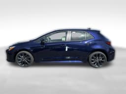 Toyota Corolla Hatchback XSE CVT (Natl) 2027 — side view