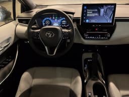 Toyota Corolla Hatchback XSE CVT (Natl) 2027 — side view