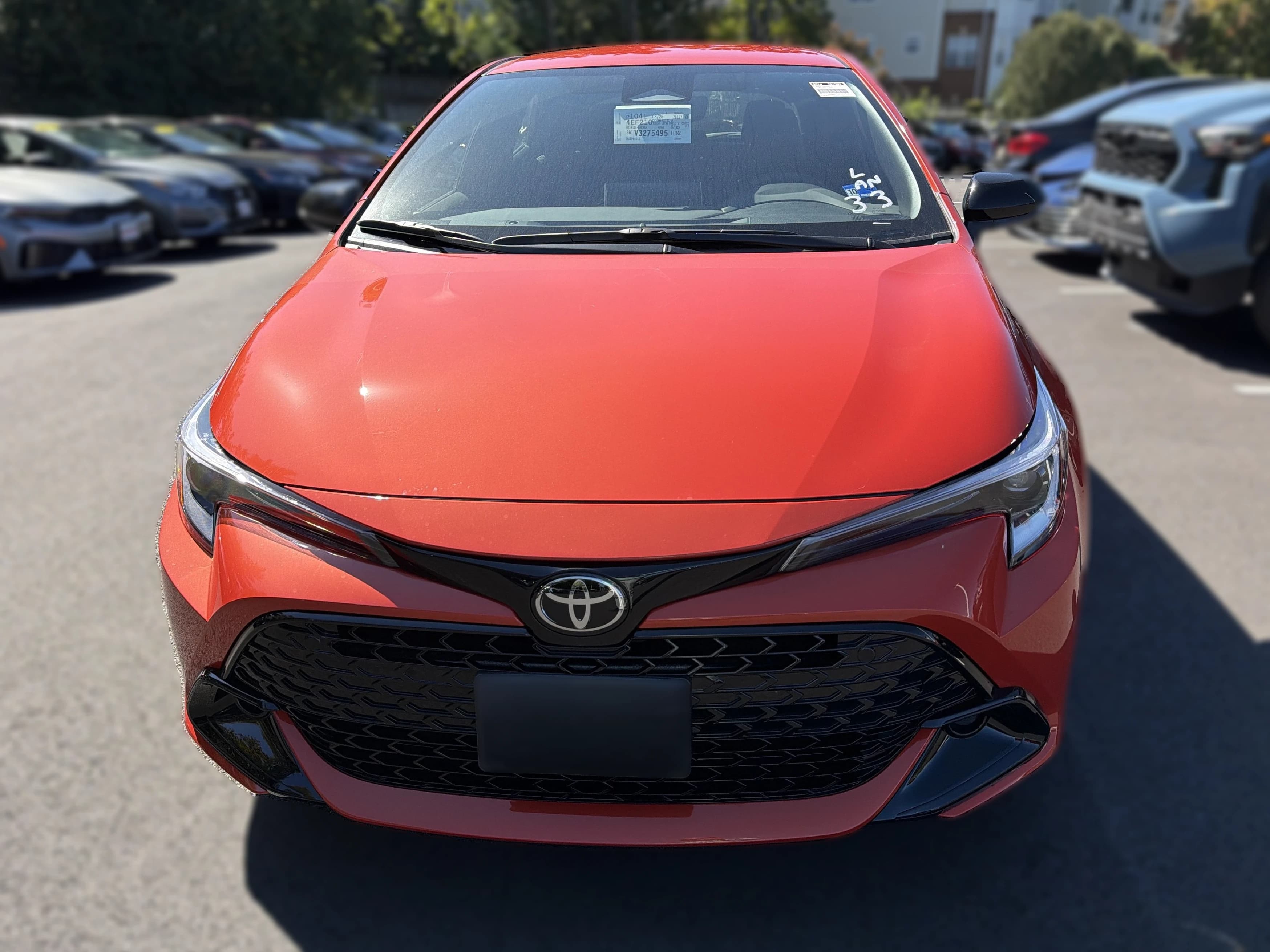 Toyota Corolla Hatchback SE CVT (Natl) 2027 — side view