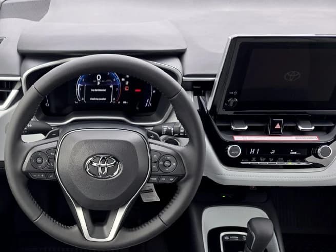 Toyota Corolla Hatchback SE CVT (Natl) 2027 — side view