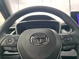 Toyota Corolla Hatchback SE CVT (Natl) 2027 — side view