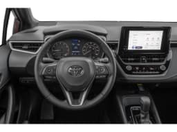 Toyota Corolla Hatchback SE CVT (Natl) 2027 — side view