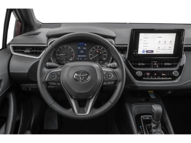 Toyota Corolla Hatchback SE CVT (Natl) 2027 — side view