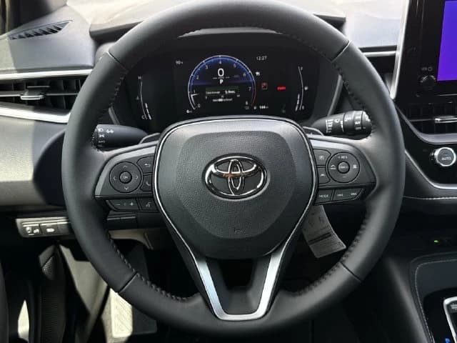 Toyota Corolla Hatchback SE CVT (Natl) 2027 — side view