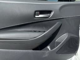 Toyota Corolla Hatchback SE CVT (Natl) 2027 — side view