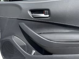 Toyota Corolla Hatchback SE CVT (Natl) 2027 — side view