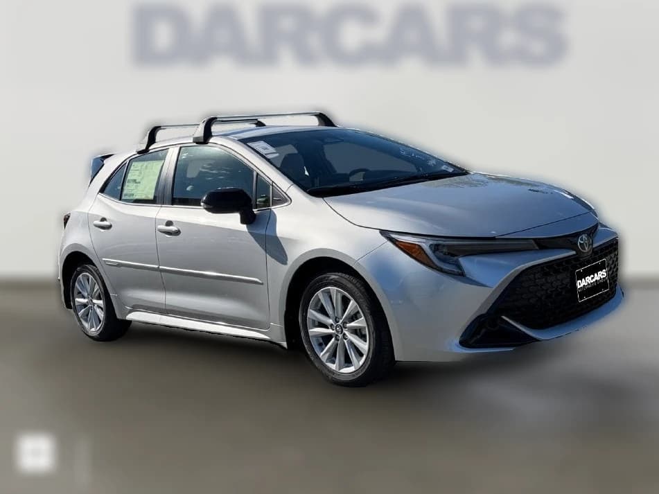 Toyota Corolla Hatchback SE CVT (Natl) 2027 — side view