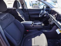 Hyundai Tucson Hybrid SE FWD 2026 — side view
