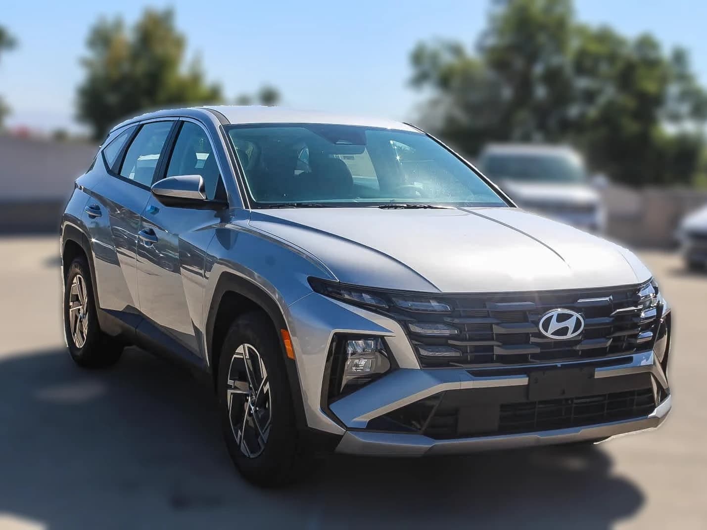 Hyundai Tucson Hybrid SE FWD 2026 — side view