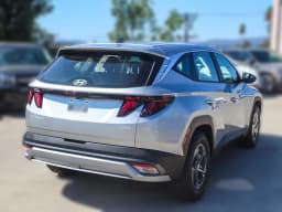 Hyundai Tucson Hybrid SE FWD 2026 — side view