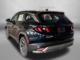 Hyundai Tucson Hybrid Blue SE AWD 2026 — side view