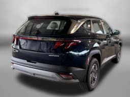 Hyundai Tucson Hybrid Blue SE AWD 2026 — side view