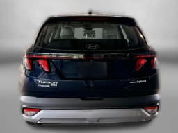 Hyundai Tucson Hybrid Blue SE AWD 2026 — side view