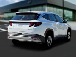 Hyundai Tucson Hybrid Blue SE AWD 2026 — side view