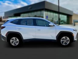 Hyundai Tucson Hybrid Blue SE AWD 2026 — side view