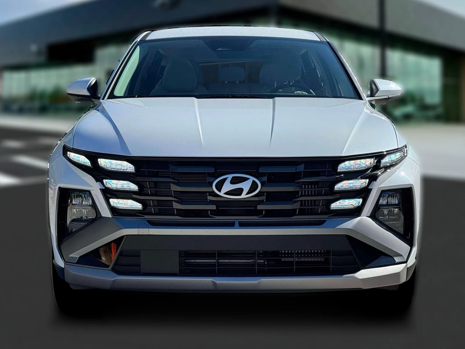Hyundai Tucson Hybrid Blue SE AWD 2026 — side view