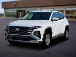 Hyundai Tucson Hybrid Blue SE AWD 2026 — side view