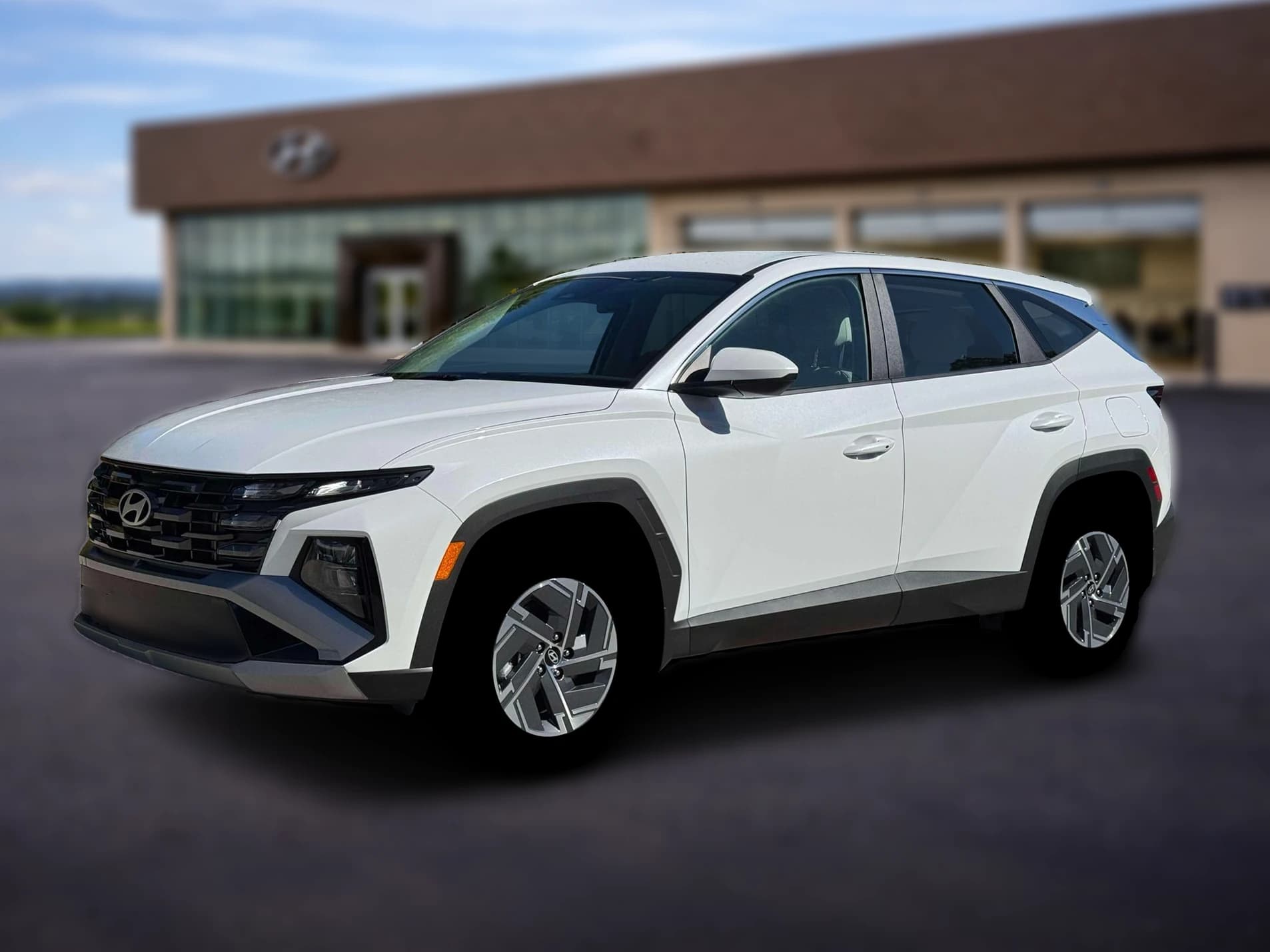 Hyundai Tucson Hybrid Blue SE AWD 2026 — side view