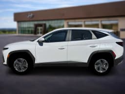 Hyundai Tucson Hybrid Blue SE AWD 2026 — side view