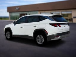 Hyundai Tucson Hybrid Blue SE AWD 2026 — side view
