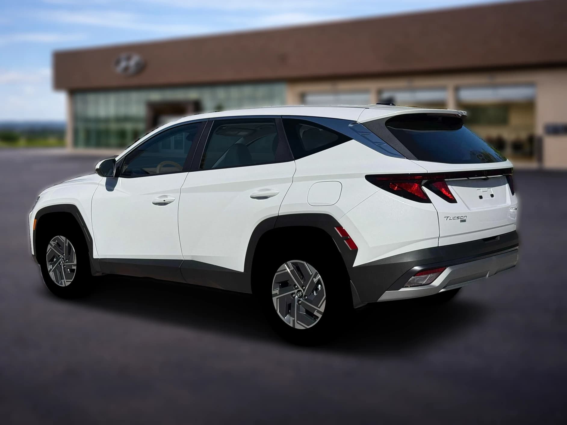 Hyundai Tucson Hybrid Blue SE AWD 2026 — side view