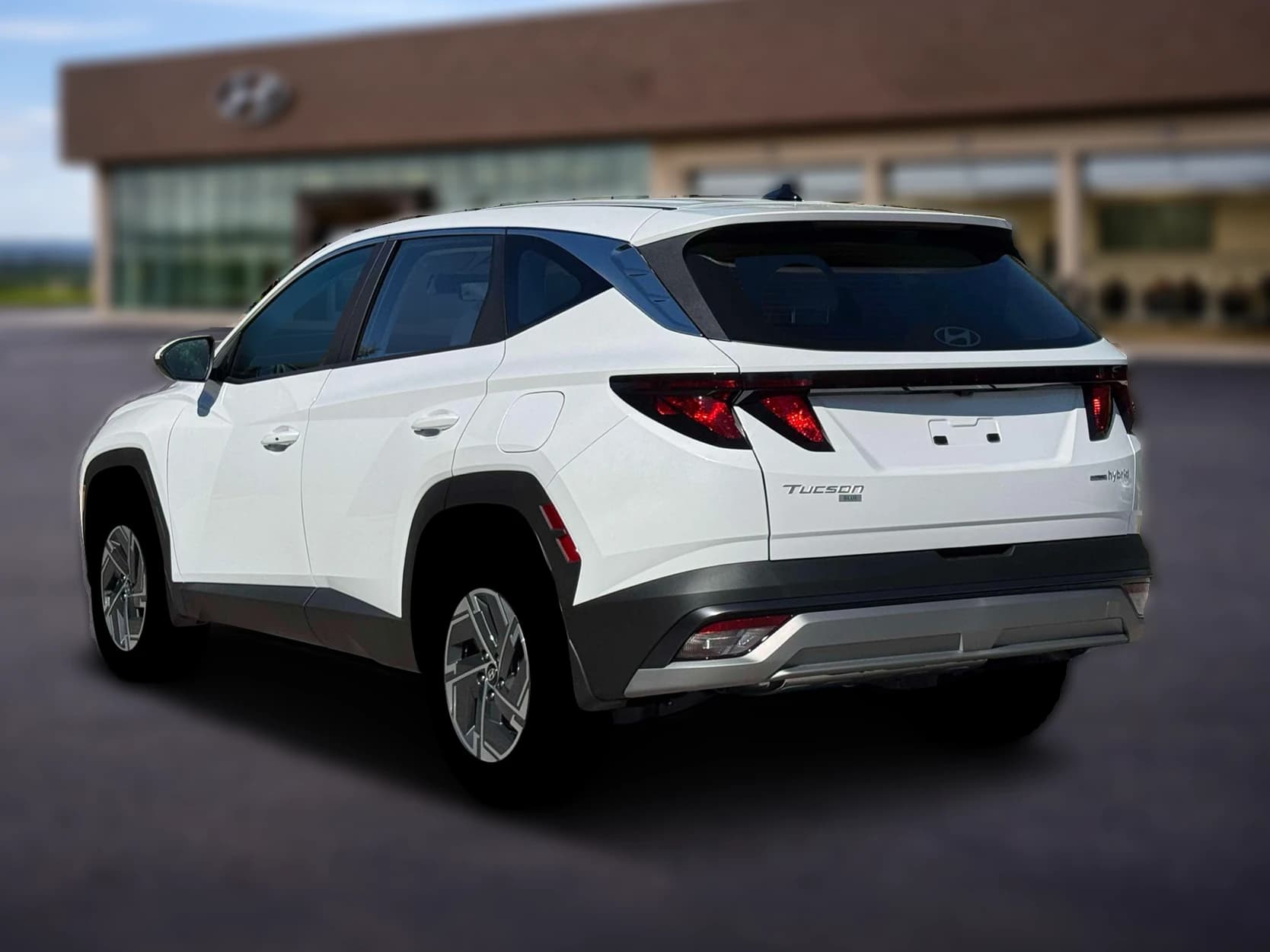 Hyundai Tucson Hybrid Blue SE AWD 2026 — side view