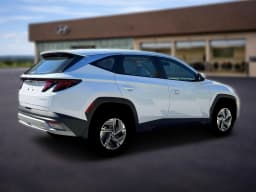Hyundai Tucson Hybrid Blue SE AWD 2026 — side view