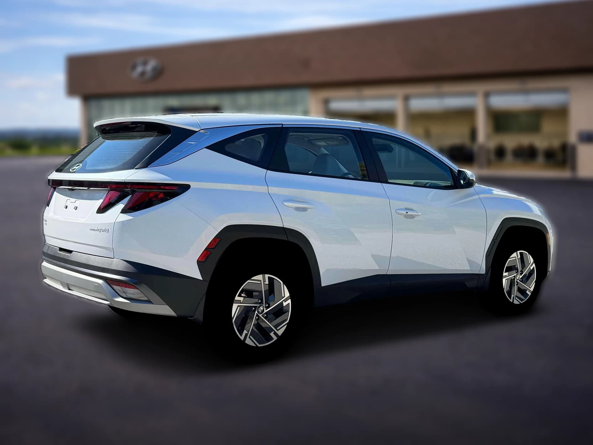 Hyundai Tucson Hybrid Blue SE AWD 2026 — side view