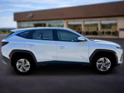 Hyundai Tucson Hybrid Blue SE AWD 2026 — side view