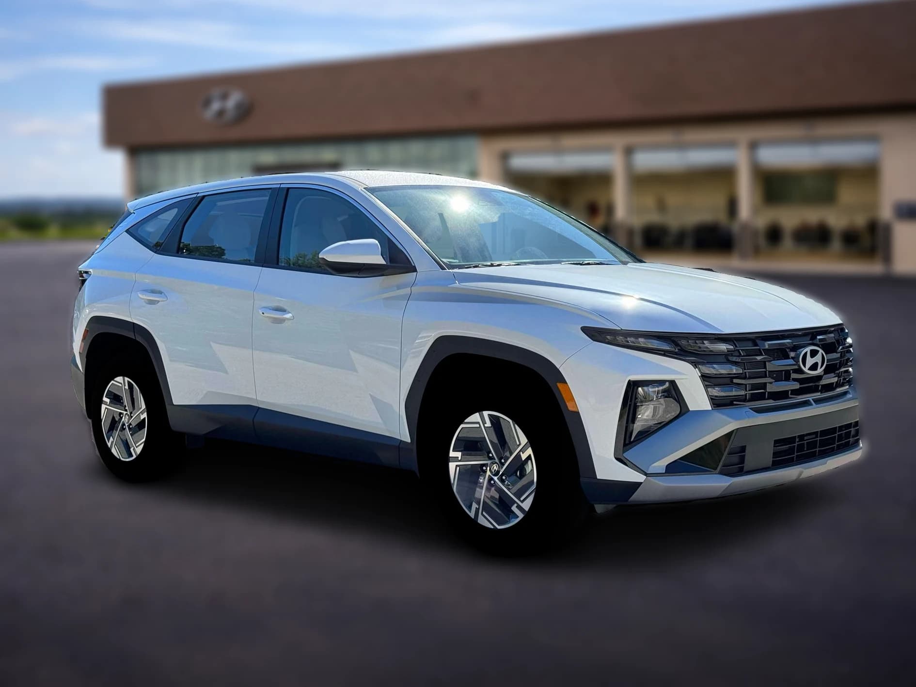 Hyundai Tucson Hybrid Blue SE AWD 2026 — side view