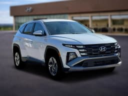 Hyundai Tucson Hybrid Blue SE AWD 2026 — side view