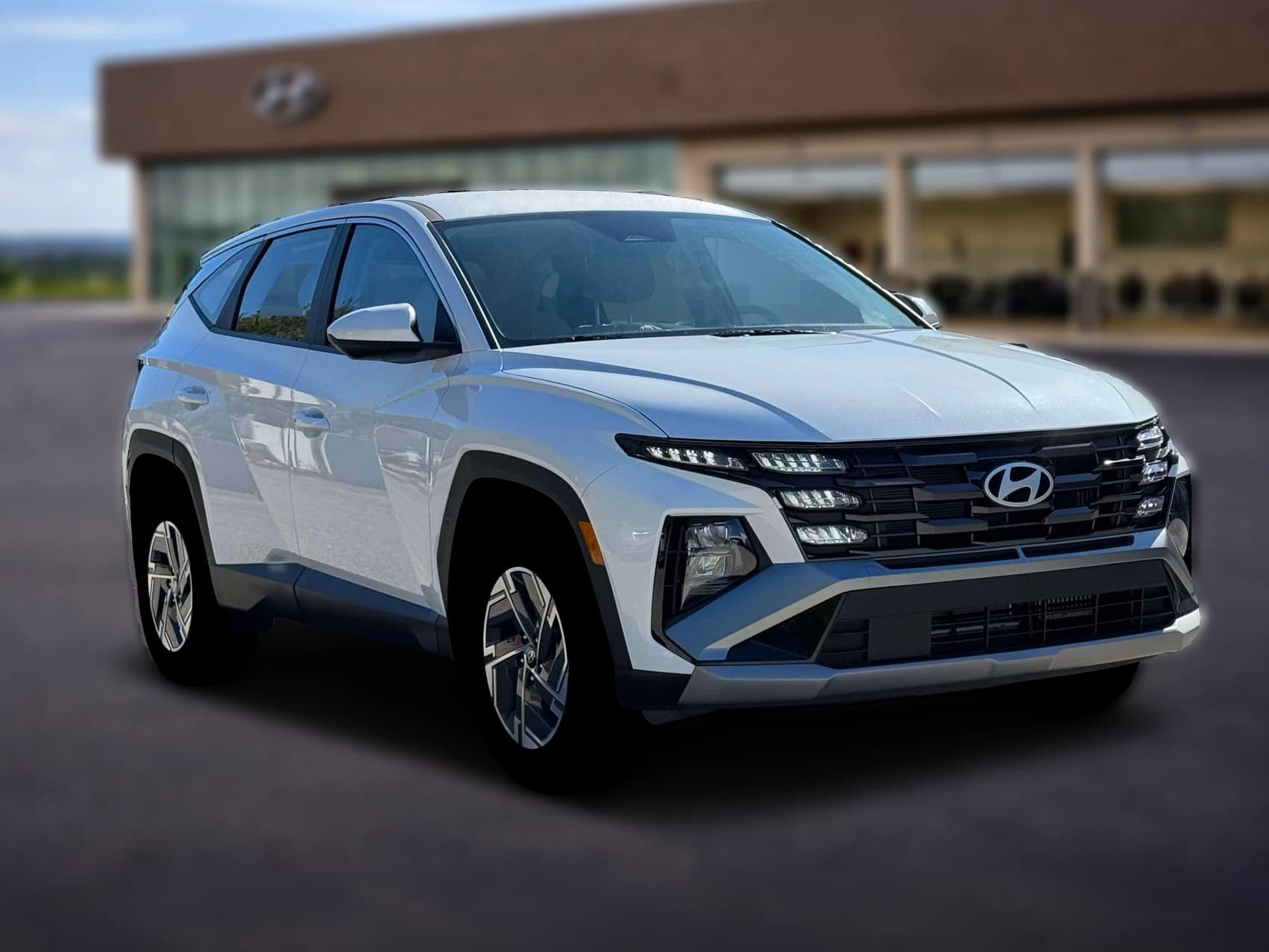 Hyundai Tucson Hybrid Blue SE AWD 2026 — side view