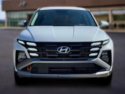 Hyundai Tucson Hybrid Blue SE AWD 2026 — side view
