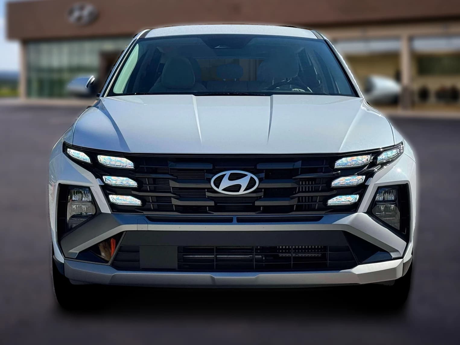 Hyundai Tucson Hybrid Blue SE AWD 2026 — side view