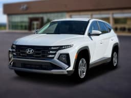 Hyundai Tucson Hybrid Blue SE AWD 2026 — side view