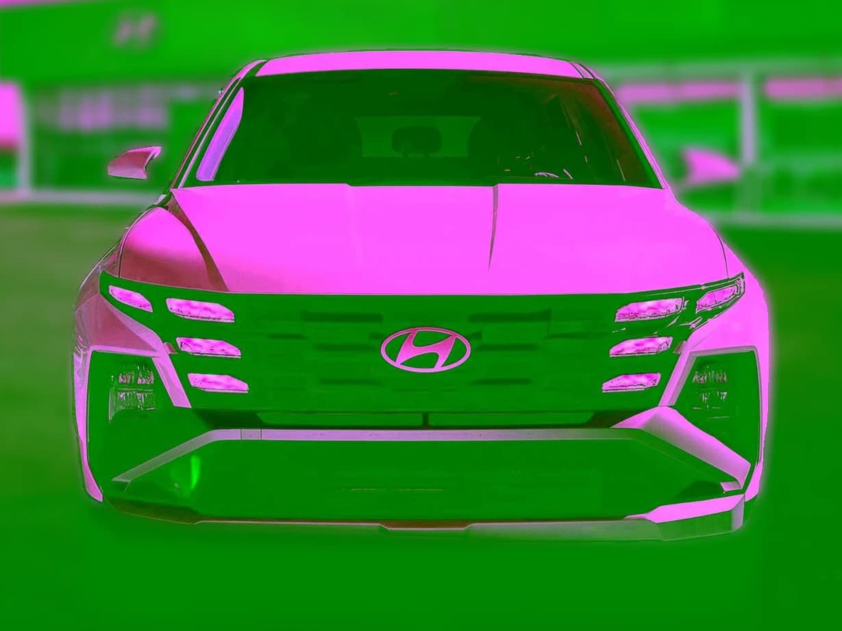 Hyundai Tucson Hybrid Blue SE AWD 2026 — side view