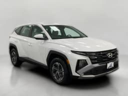 Hyundai Tucson Hybrid Blue SE AWD 2026 — side view
