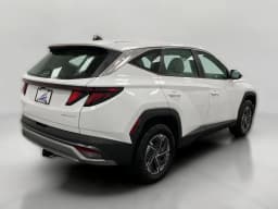 Hyundai Tucson Hybrid Blue SE AWD 2026 — side view