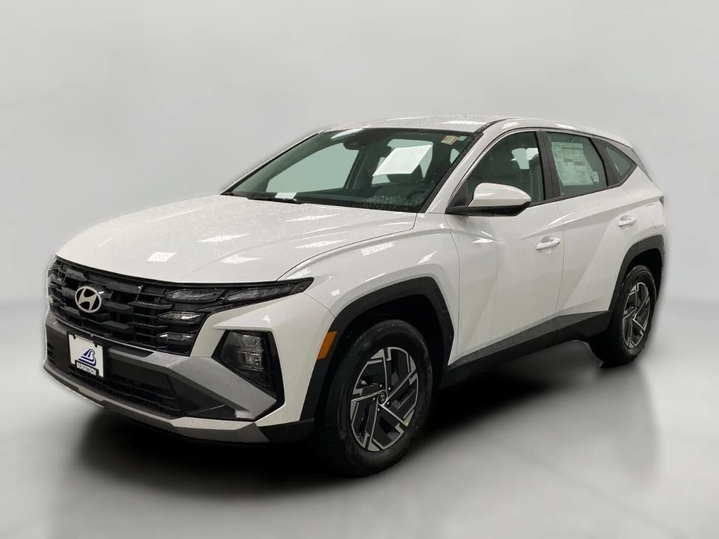 Hyundai Tucson Hybrid Blue SE AWD 2026 — side view