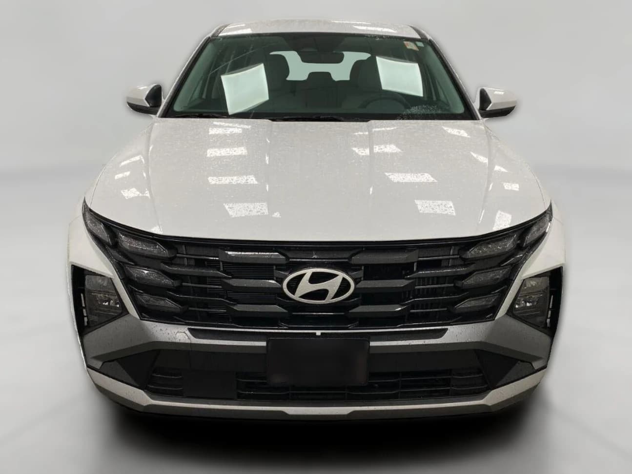 Hyundai Tucson Hybrid Blue SE AWD 2026 — side view